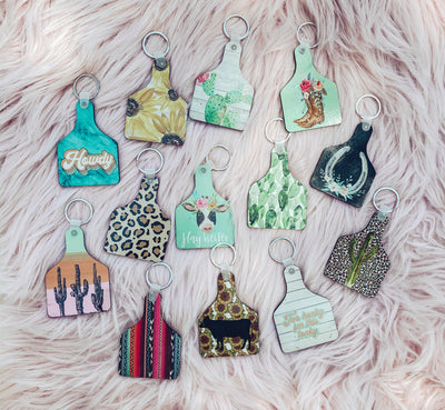 Cow Tag Keychains-401 CAR ACCESSORIES-Adelyn Elaine's-Adelyn Elaine's Boutique, Women's Clothing Boutique in Gilmer, TX