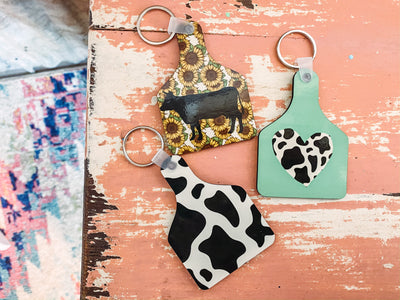 Cow Tag Keychains-401 CAR ACCESSORIES-Adelyn Elaine's-Adelyn Elaine's Boutique, Women's Clothing Boutique in Gilmer, TX