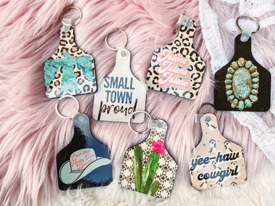 Cow Tag Keychains-401 CAR ACCESSORIES-Adelyn Elaine's-Adelyn Elaine's Boutique, Women's Clothing Boutique in Gilmer, TX